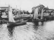 A black and white photo of fishing boats on the Charles LeClair