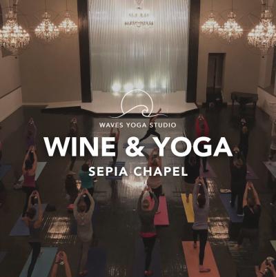 Folks on mats doing yoga in a chapel setting.