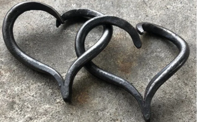 Two metal intertwined hearts.