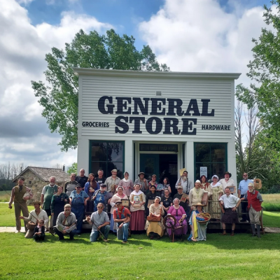 A bunch of artisans in front of the Pinecrest's General Store.