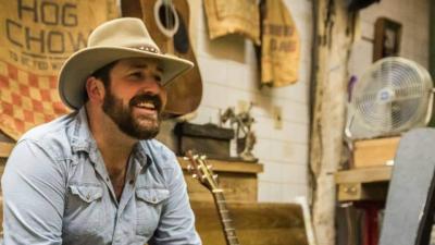 Man with hat, singer/musician Logan Spicer