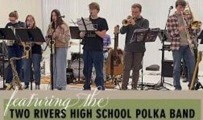 Six musicians playing onstage.