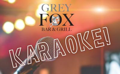 Event banner featuring a microphone presumably onstage with stage lights behind.