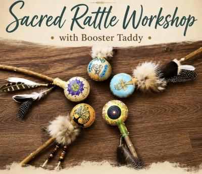 Wooden painted rattles with embellisments including feathers, fur and beads.