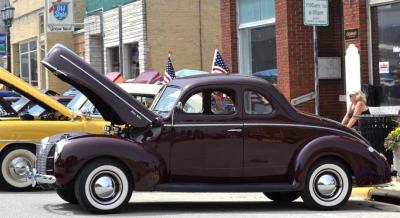 Restored classic purple car.