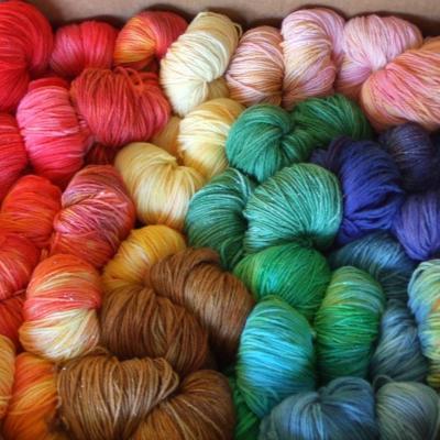 Many balls of colorful yarn.