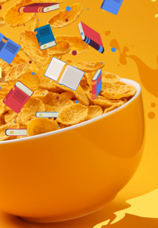 Bowl of cereal with tiny books dropping in.