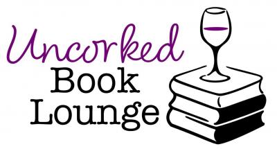 Stack of books with a half-filled wine glass sitting atop.