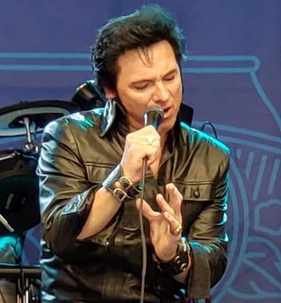 Singer Tony Rocker onstage.