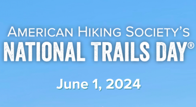 Blue box with white text reading American Hiking Society's National Trails Day June 1, 2024.