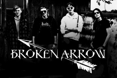 B/W image of four members of Broken Arrow band.