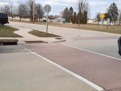 Red, stamped crosswalk