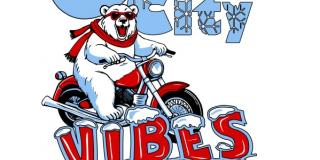 Polar bear on a motorcycle.
