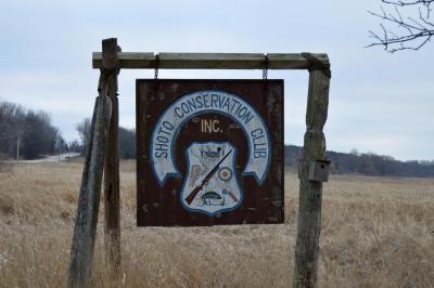 Photo of outdoor wooden sign with "Shoto Conservation Club" written on it.