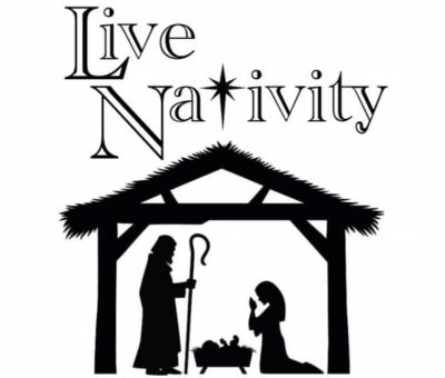 Live Nativity; silhouette of Mary and Joseph inside the stable.